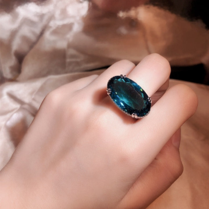 Oval Blue Topaz Cocktail Ring Vintage Hollow Filigree Halo Statement Ring For Women