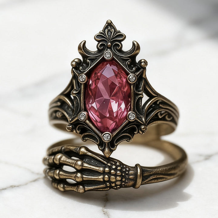Gothic Vintage Pink Gem Skeleton‑Hand Ring Dark‑Aesthetic Carved Band