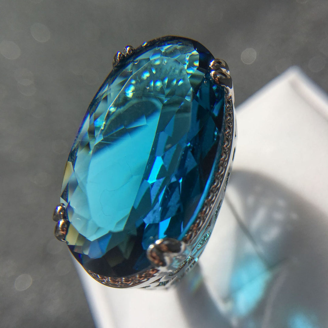 Oval Blue Topaz Cocktail Ring Vintage Hollow Filigree Halo Statement Ring For Women