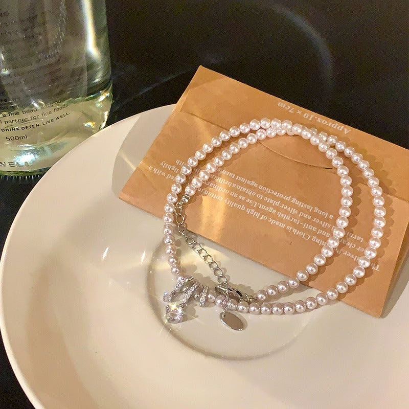 Elegant Pearl Bow Pendant Necklace