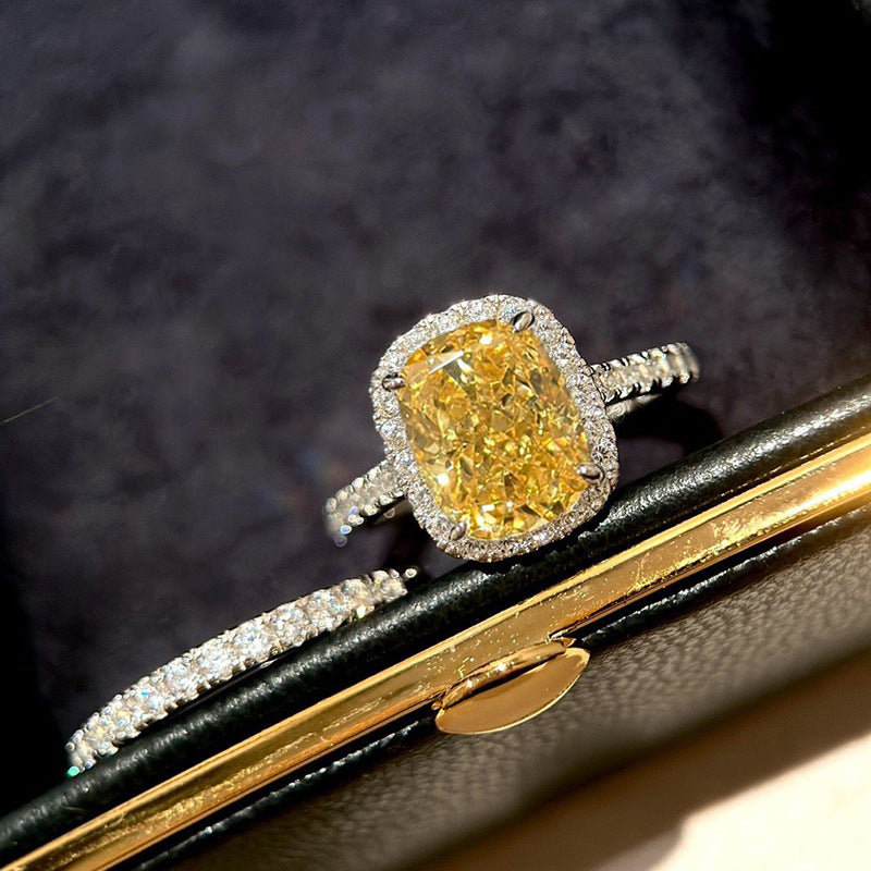 Cushion Cut Yellow Diamond Halo Ring with Paved Band