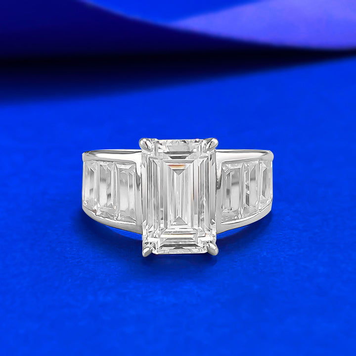 Emerald Cut Diamond Three-Stone Ring with Side Baguette Accents