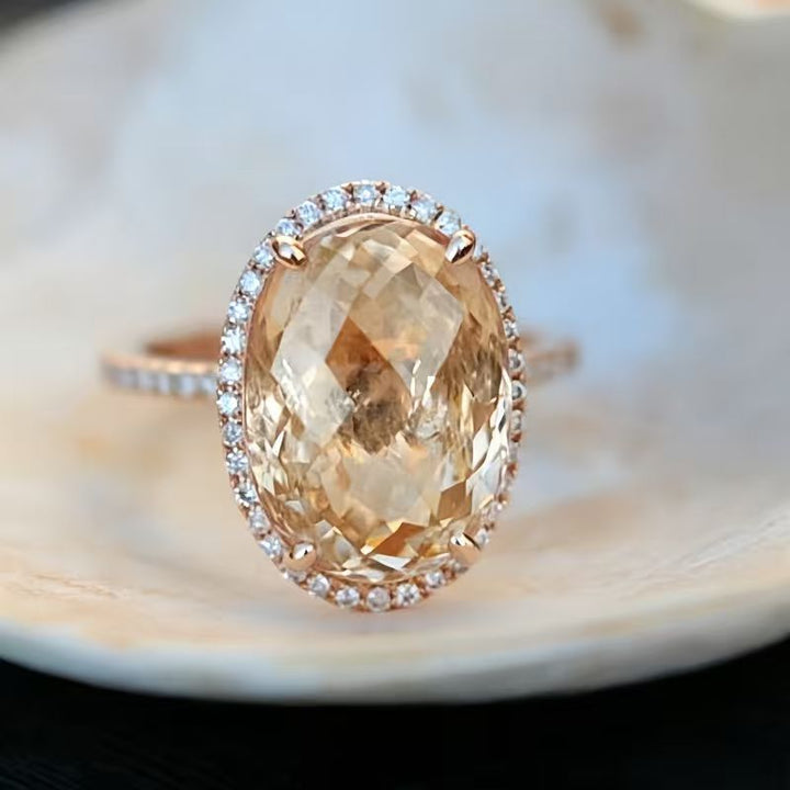 Oval Golden Gemstone Halo Ring