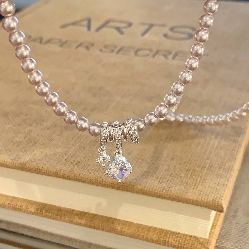 Elegant Pearl Bow Pendant Necklace