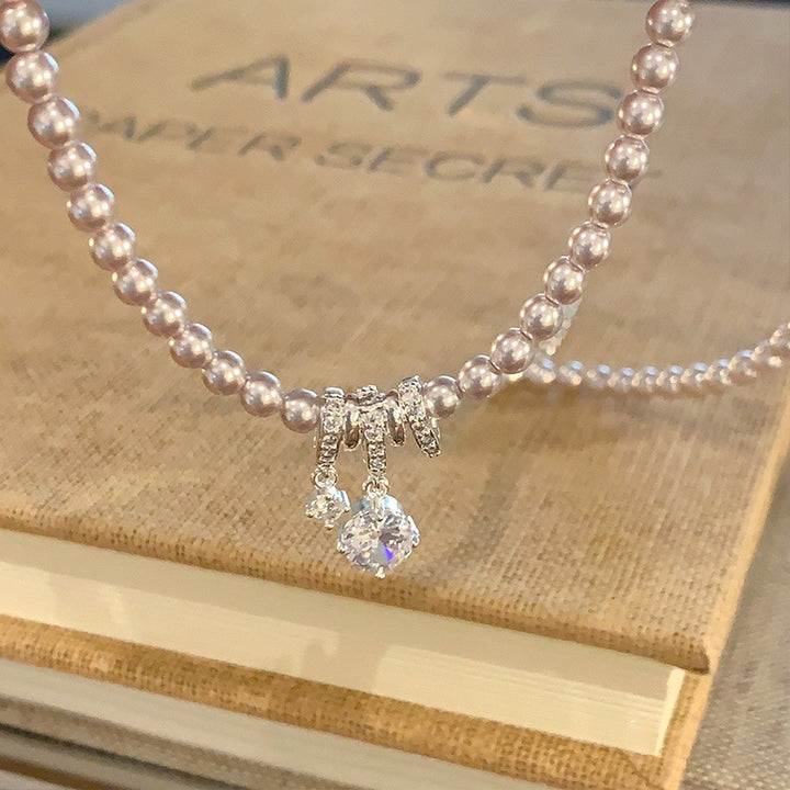Elegant Pearl Bow Pendant Necklace