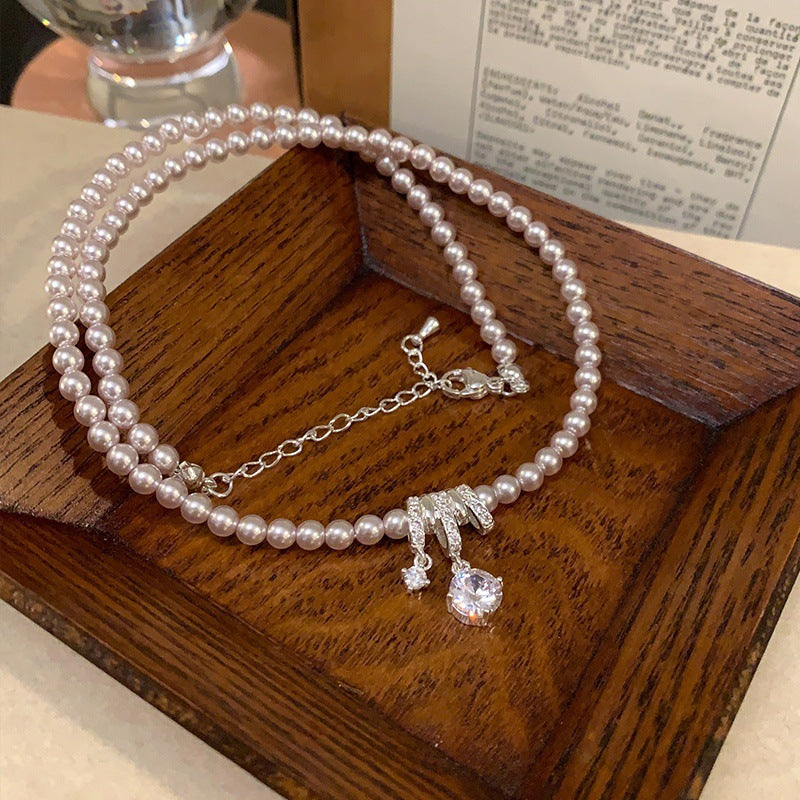 Elegant Pearl Bow Pendant Necklace