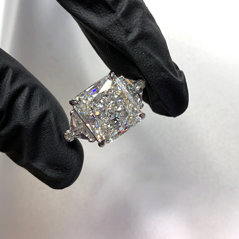 Cushion Cut Three-Stone Diamond Ring with Shield Side Stones