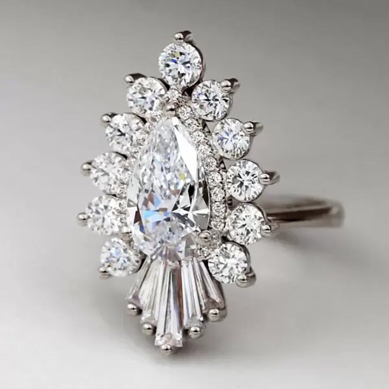 Pear Cut Diamond Statement Ring with Fan Tapered Baguette Accents