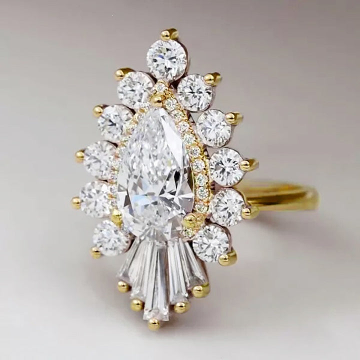 Pear Cut Diamond Statement Ring with Fan Tapered Baguette Accents