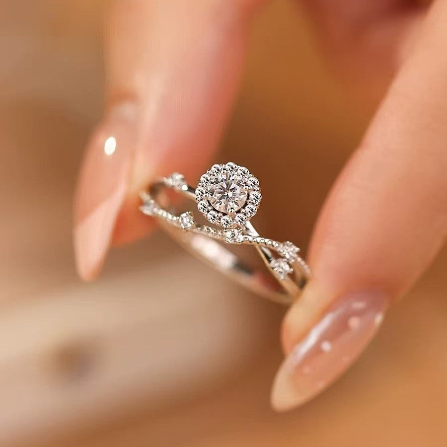 Halo Twist Diamond Ring in Sterling Silver