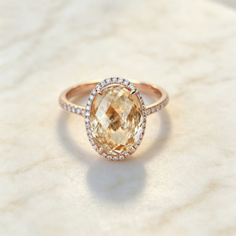 Oval Golden Gemstone Halo Ring