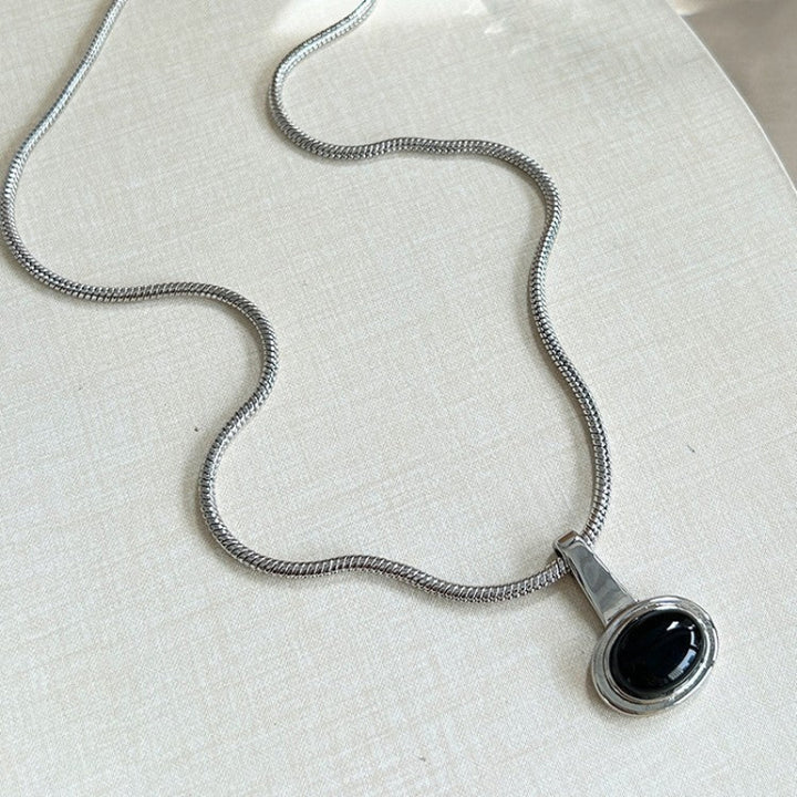Black Gemstone Necklace With Snake Chain And Round Pendant
