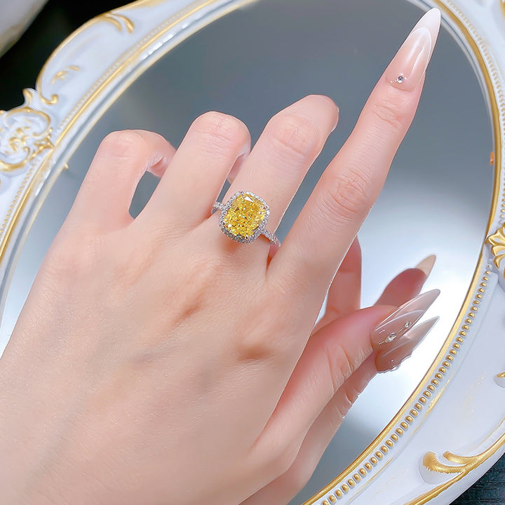 Cushion Cut Yellow Diamond Halo Ring with Paved Band