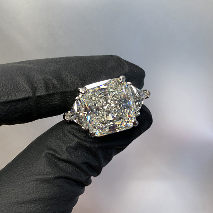 Cushion Cut Three-Stone Diamond Ring with Shield Side Stones