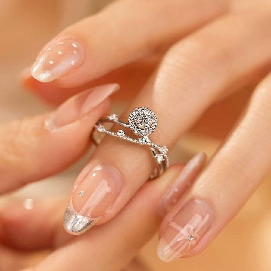 Halo Twist Diamond Ring in Sterling Silver