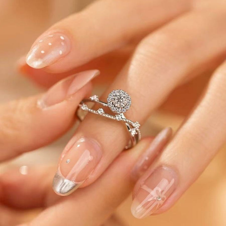 Halo Twist Diamond Ring in Sterling Silver