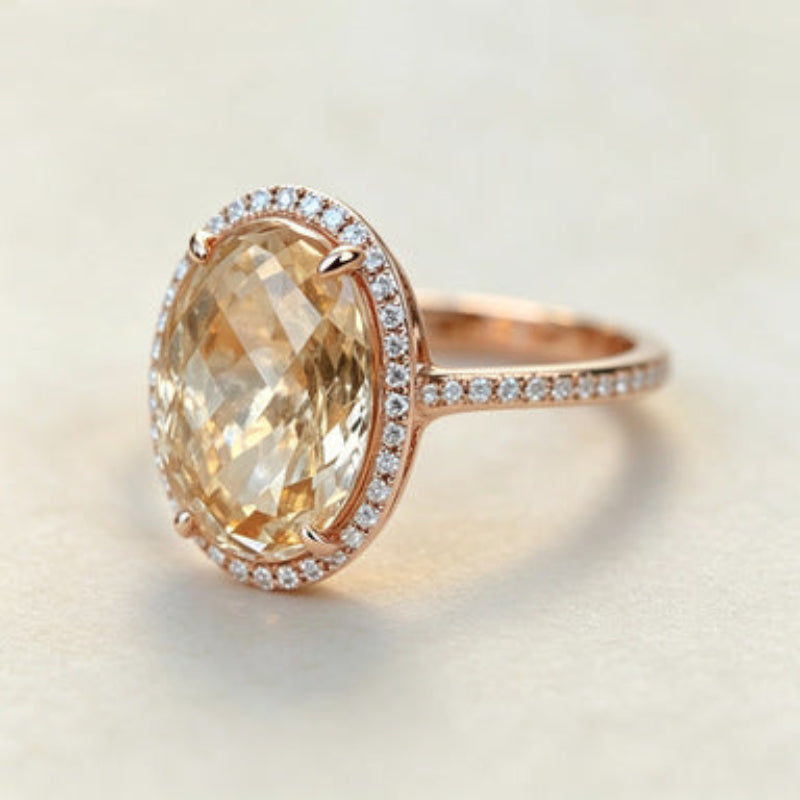 Oval Golden Gemstone Halo Ring