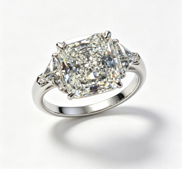 Cushion Cut Three-Stone Diamond Ring with Shield Side Stones