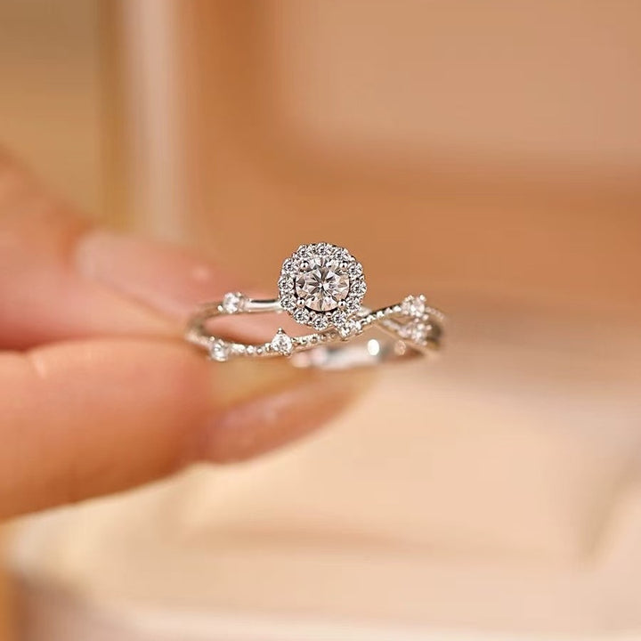 Halo Twist Diamond Ring in Sterling Silver