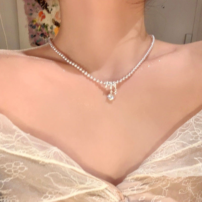 Elegant Pearl Bow Pendant Necklace